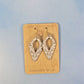 White and Gold Leatherette Dangle Earrings