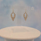 White and Gold Leatherette Dangle Earrings